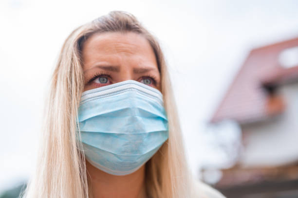 istock Young woman with protective face mask 1248905585