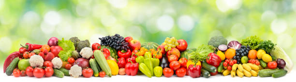 istock Panoramic photo multi-colored fruits and vegetables 1248910280