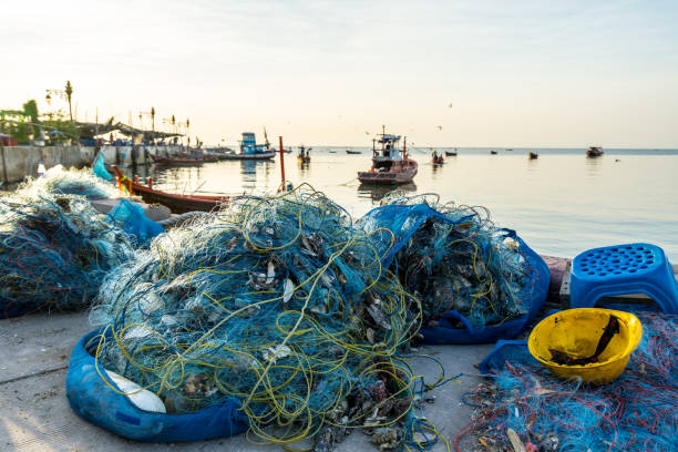 Fishing nets for fishermen by the shore stock photo