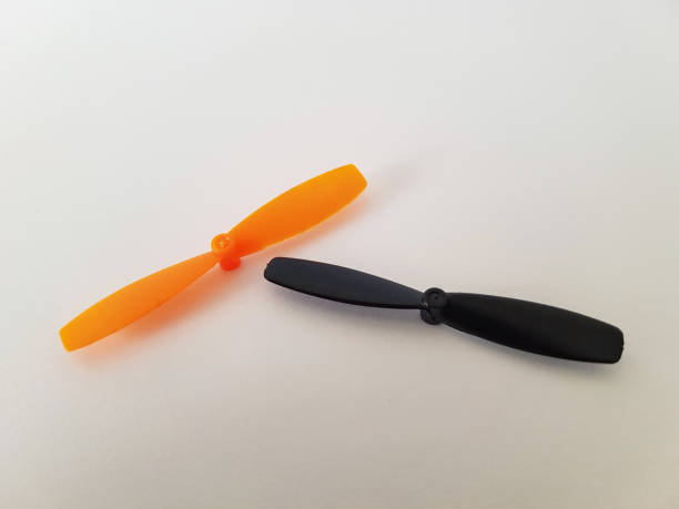 istock Orange and Black Micro Drone Propellers, Isolated on White Background 1248913783
