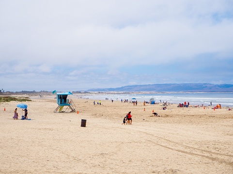 July 20 2019, Avila Beach in California : tourists are enjoying the beach even though the day is not really sunny.