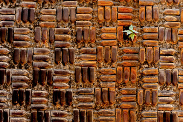 istock Wall made of brown medicine bottles 1248917643