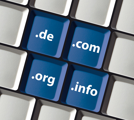 Extensiones de dominio en teclas de teclado de PC azul - nternet sitio web en línea photo