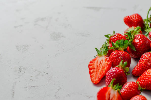 istock Strawberries on the gray background 1248928425