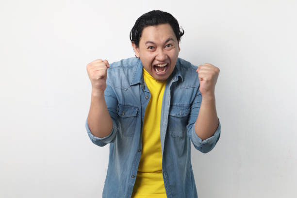 istock Surprised Happy Asian Man, Winning Victory Celebration 1248932778