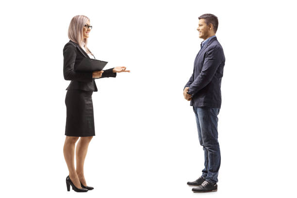 istock Professional man and woman standing and talking talking 1248933023