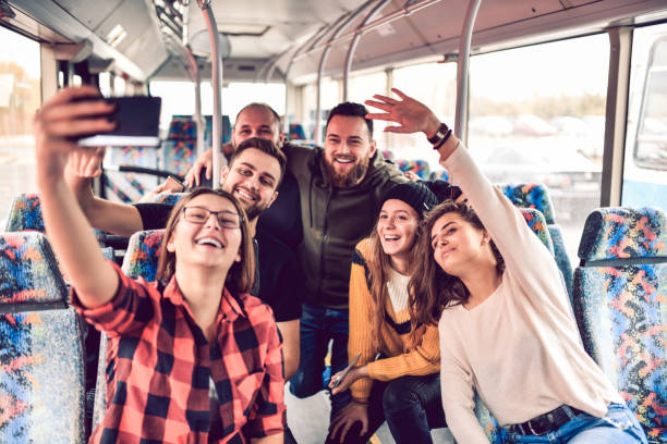 istock Cute Friends Taking Selfie In The Bus 1248936107