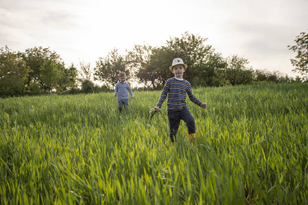 istock Kids running in nature 1248936117
