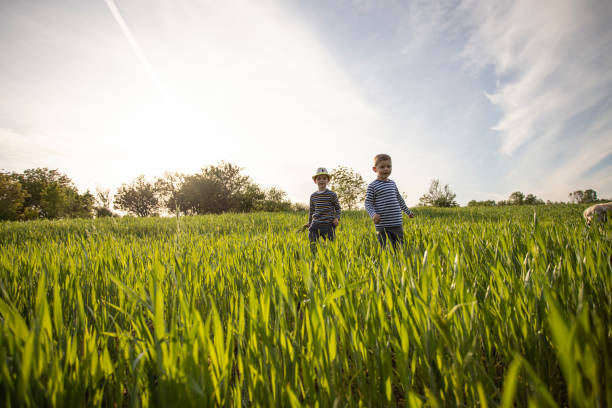 istock Kids running in nature 1248936173