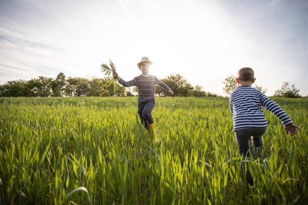 istock Kids running in nature 1248936187
