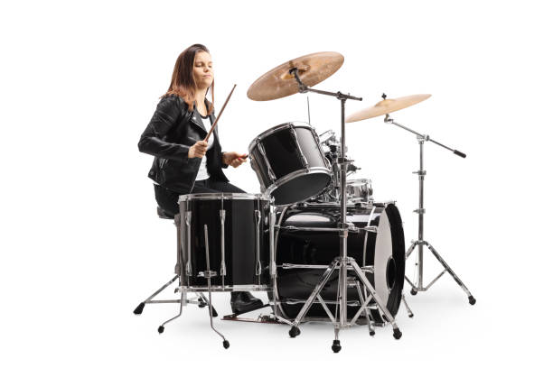 istock Young female musician playing a drum kit 1248937303