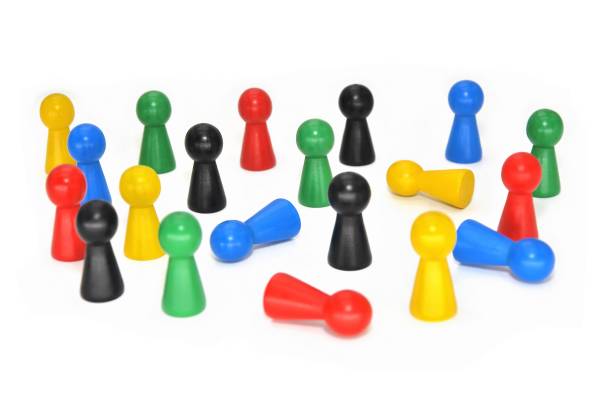 istock colored wooden pawns 1248939534