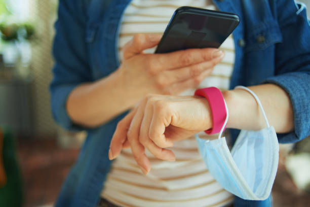 istock modern woman checking step stats in house 1248941491