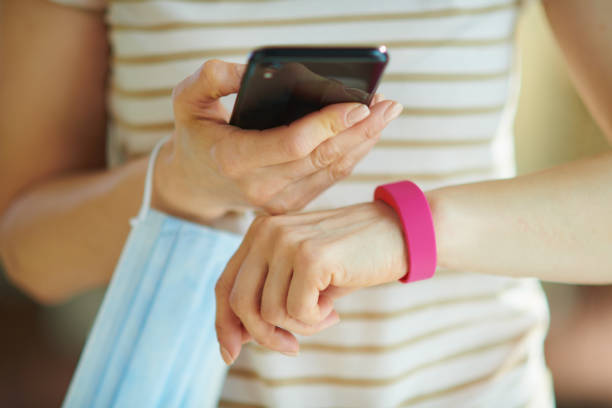 istock modern 40 years old housewife checking step stats in house 1248941498