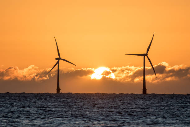 istock Solar energy and wind power. Sustainable resources. Beautiful sky sunrise. 1248945204