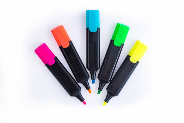 Five Colorful Markers On A White Background, Top View. Arranged in a semi-circle with Open Caps. Sketch Pens. Highlighters. Felt Tip. Concept Shot. Creative Shot of Five Highlighters On A White Background styled in a semi-circle form. Sketch Pens. Highlighters. Felt Tip. Concept Shot. permanent marker stock pictures, royalty-free photos & images
