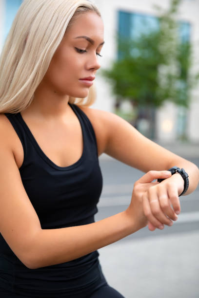 istock Focused Woman Checking Performance and Tracking On Smartwatch After Exercise 1248947026
