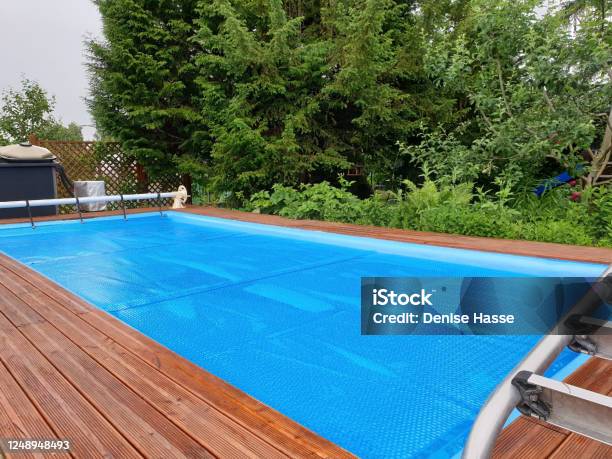 Pool Cover For Winter Protection Stock Photo - Download Image Now - Swimming Pool, Covering, Tarpaulin