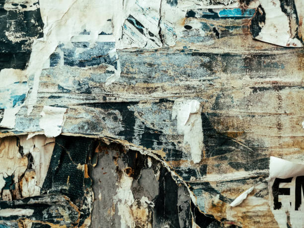 istock Old ripped blank torn grunge posters texture background 1248951519