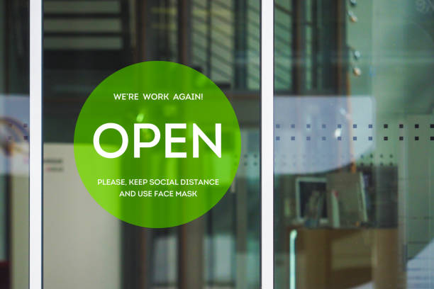 Open store, sign on the front door after quarantine. Welcome back! We are work again. Please, keep social distance and use face mask