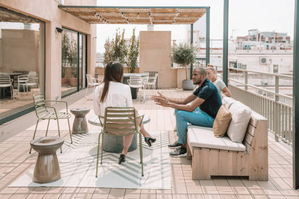 istock Colleagues having a break at the terrace in Barcelona 1248956391