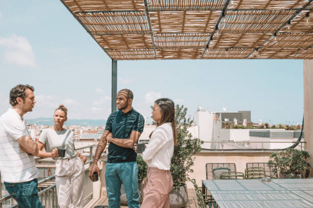 istock Colleagues having a break at the rooftop in Barcelona 1248957235