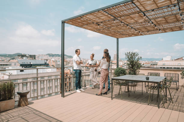 istock Colleagues having a break at the terrace in Barcelona 1248957820