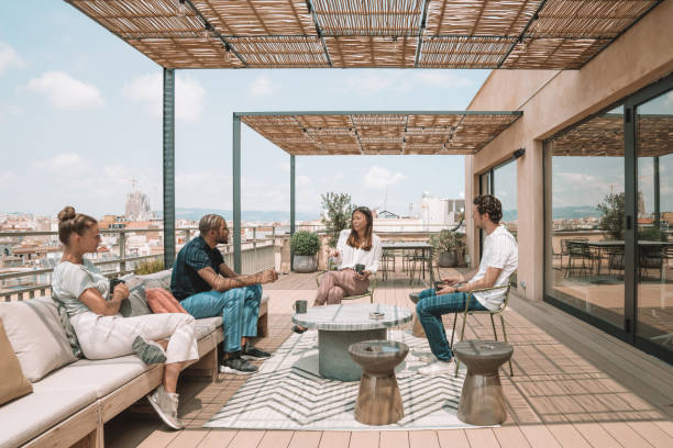 istock Colleagues having a break at the rooftop in Barcelona 1248958080