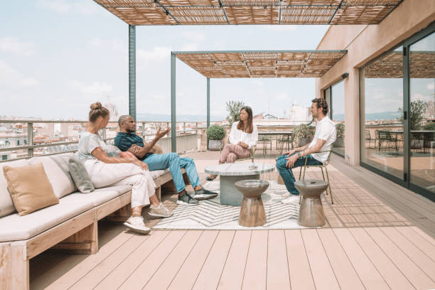 Colleagues having a break at the rooftop in Barcelona