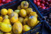 Rotten lemons at a market