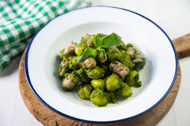 istock Gnocchis with pesto and salchicha 1248965348