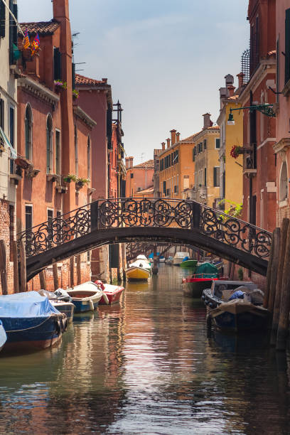 istock beautiful bridge over a canal in Venice 1248966355