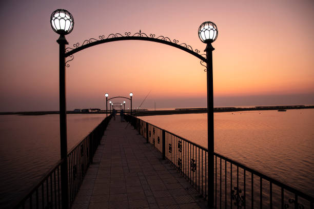 Wooden bridge pier, Twilight on the sea