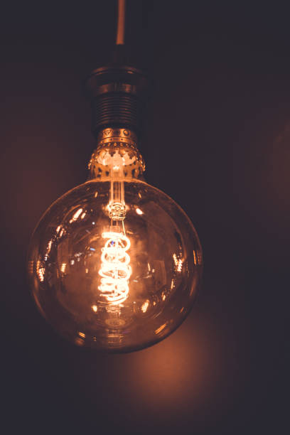 istock Close-Up of Illuminated Light Bulbs 1248969885