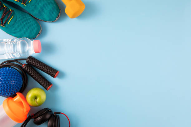 istock Sports Equipment and Accessories on Blue Background 1248972425