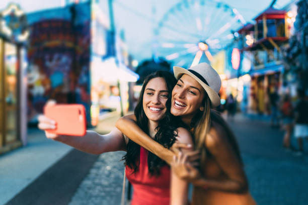 istock Friends on summer travel taking selfie together 1248973185