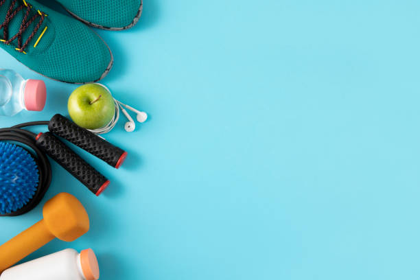 istock Sports Equipment and Accessories on Blue Background 1248974324