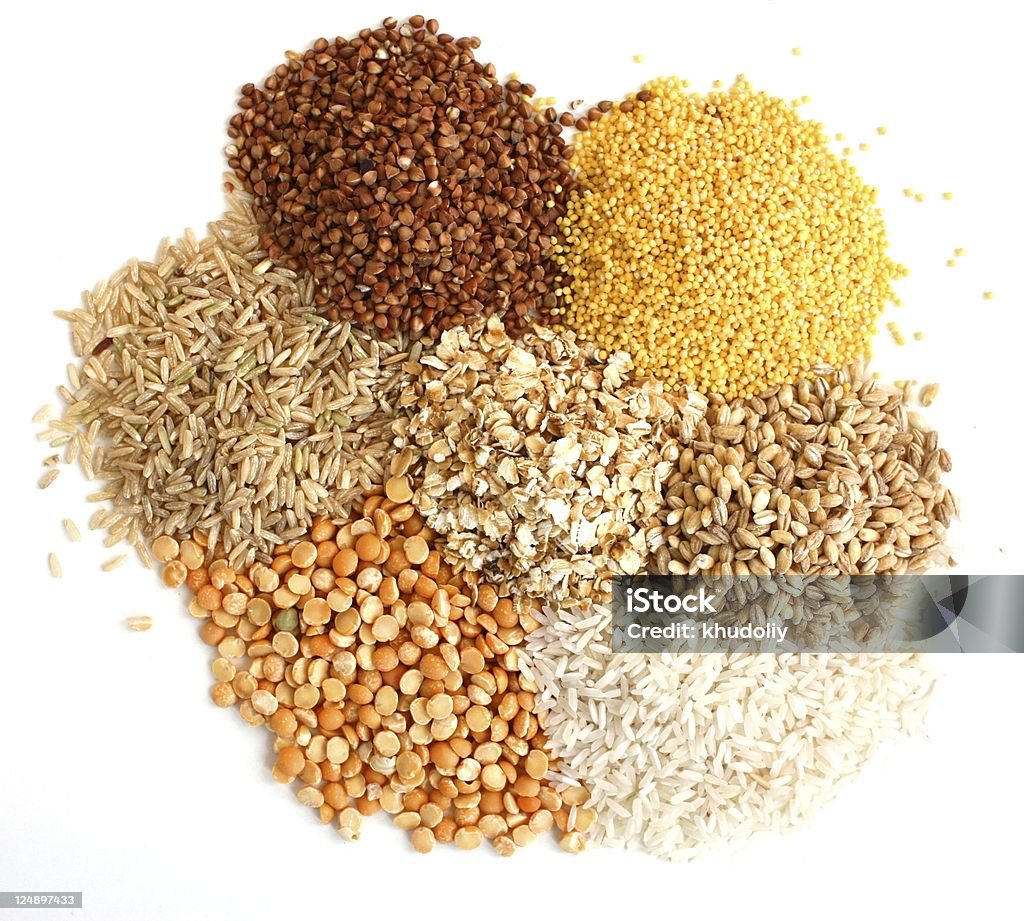 Piles of different types of grains Different kinds of grain, rice, peas, rye, millet, sarrazin, an oats, millet, barley. Wholegrain Stock Photo