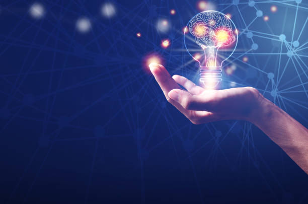 istock Light bulb with brain inside the hands of the businessman and point connecting network on blue background. Creative The brain in the light bulb, The concept of the business idea 1248974438