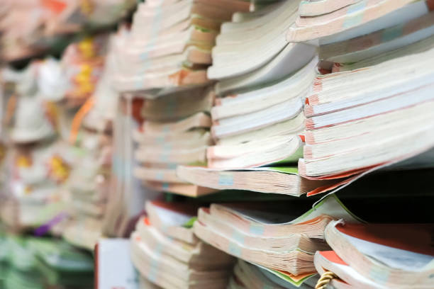 istock Stack of books background. Old books piles 1248978757