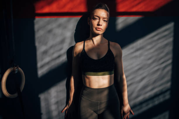 istock Beautiful fit woman alone in gym 1248981822