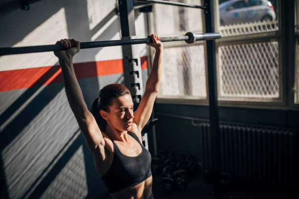 istock Fit young woman training alone in gym 1248982512