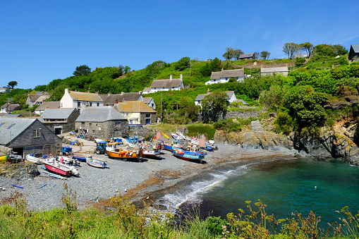 The harbour and beach at Cadgwith, a village on the Cornish peninsula, Cornwall, UK.