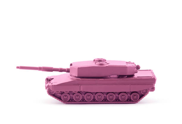Pink tank toy miniature isolated on white background with clipping path
