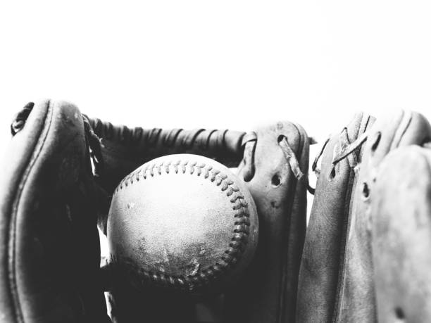 baseball glove and ball, vintage texture in black and white - catching horizontal nobody baseballs imagens e fotografias de stock