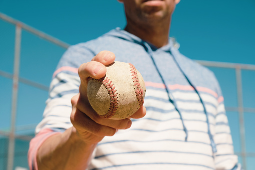 Grip on baseball ball close up