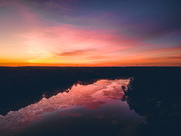 istock Sky reflection. Beautiful sunset on the lake 1248987704