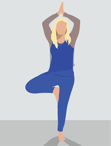 Blond woman in vrkasana yoga pose wearing a blue solid colour workout outfit