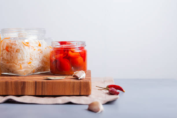 istock Fermented vegetables in jars on the table 1248989303