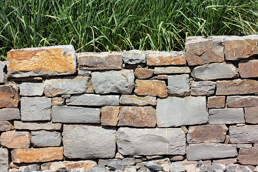 The section of a wall of natural stones